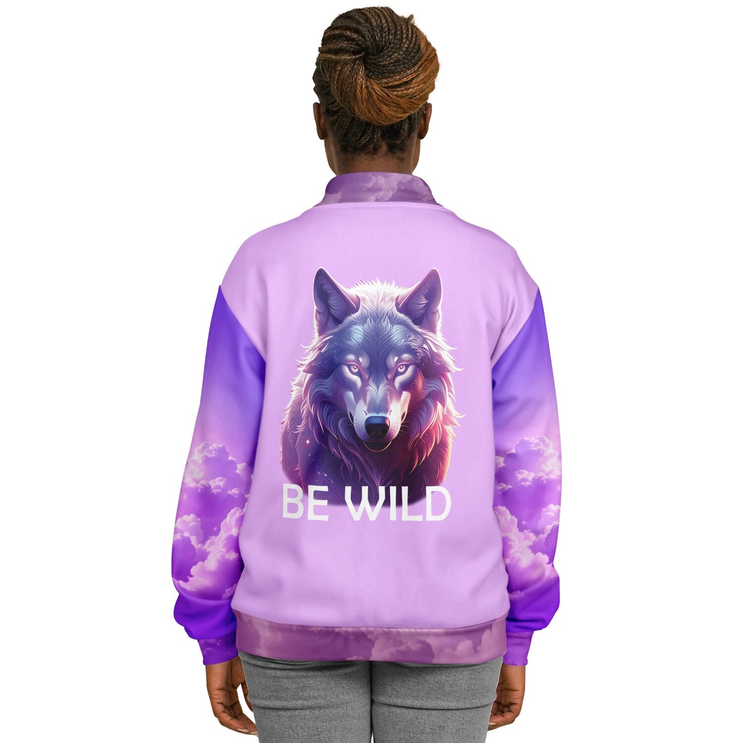 Person wearing a purple jacket with a wolf design and 'BE WILD' text on the back.